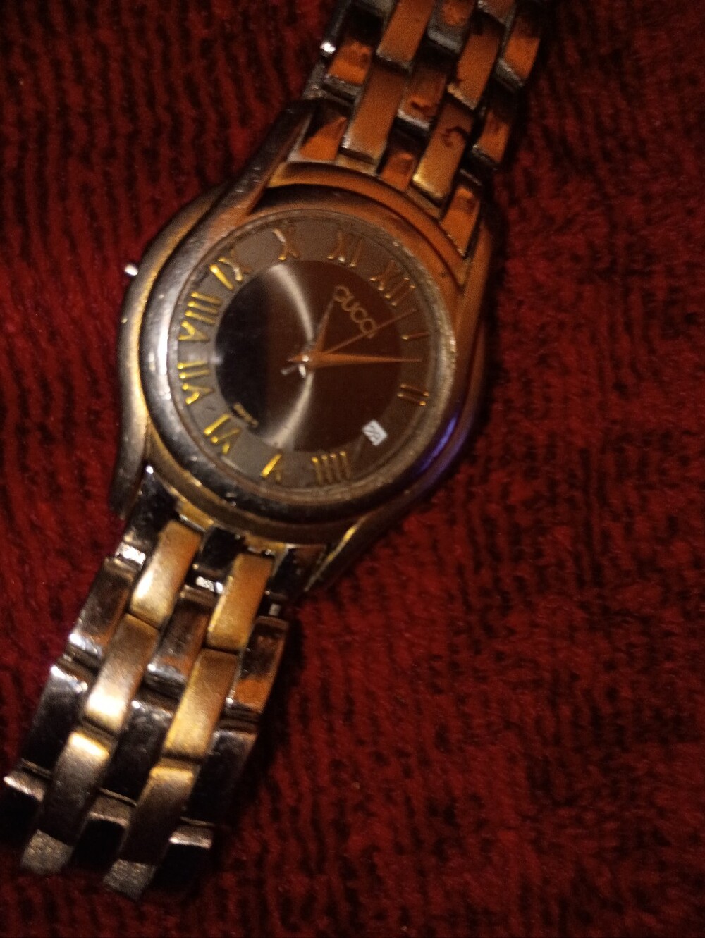 Gucci Two-Tone Gold and Silver Round Dial Watch .